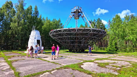 Slow-motion-shot-capturing-tourists-at-Irbene-radio-telescope-in-Latvia-during-daytime