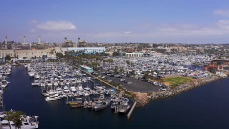 Aerial-descending-close-up-shot-of-the-boat-landing-at-King-Harbor-Marina-in-Redondo-Beach,-California