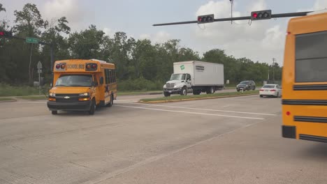 Two-new-CCISD-busses-being-delivered-to-the-CCISD-transportation-dept-in-League-City,-Texas