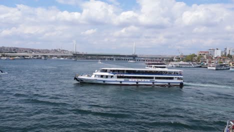 A-passenger-ship-glides-across-the-waters-of-Bosporus-Bay-in-Istanbul,-Turkey