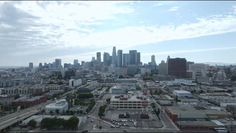 Aerial-view-capturing-the-expansive-Los-Angeles-skyline,-offering-a-sweeping-vista-that-showcases-the-city's-iconic-landmarks-and-bustling-urban-landscape