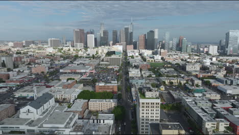 Panoramic-aerial-view-of-the-vast-Los-Angeles-skyline,-providing-a-sweeping-perspective-that-highlights-the-city's-iconic-landmarks-and-vibrant-urban-landscape