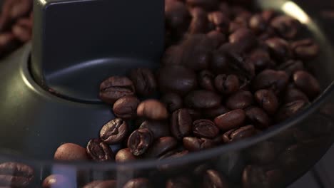 Coffee-beans-are-poured-into-a-coffee-grinder