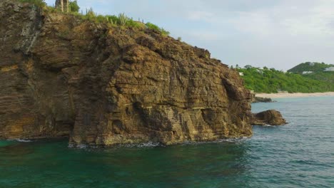 Pan-shot-of-famous-David's-hole-near-Baie-Rouge-Beach-during-daytime-in-Carribean-Island