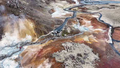 Aerial-view-of-Geothermal-Area-Seltun-south-of-Reyjkavik-showcases-the-area's-natural-wonders,-inviting-visitors-to-explore-and-experience-the-beauty-of-Iceland's-geothermal-landscapes