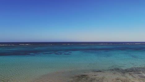 Scenic-aerial-view-of-Zanzibar-coast,-white-sand-beaches-and-turquoise-waters,-Tanzania