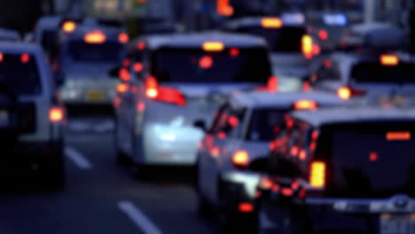 Busy-street-at-night-with-cars-stuck-in-a-traffic-jam