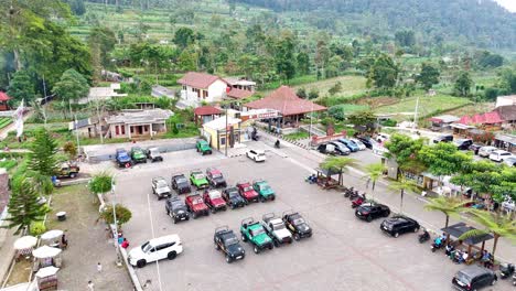 Aerial-view-of-car-parked-on-the-entrance-gate-of-Mount-Telomoyo