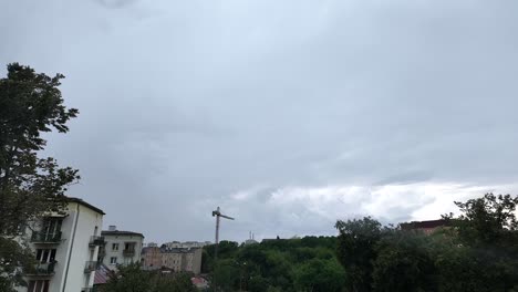 Storm-clouds-in-a-big-city,-time-lapse