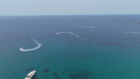 Tourists-Having-Fun-Doing-Water-Sports-Activity-In-The-Ocean-During-Summer-Vacation-In-Malta