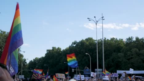 Gay-pride-event-featuring-a-rainbow-fan,-symbolising-inclusivity-and-joy