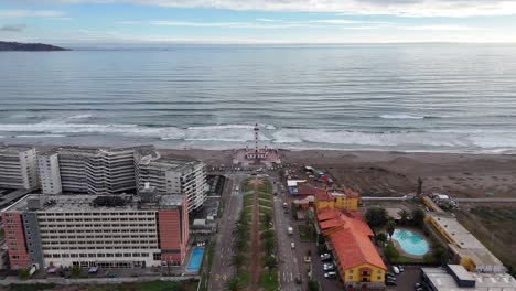 Buildings-and-residential-areas-near-the-Monumental-Lighthouse-on-La-Serena-beach-located-in-the-city-of-La-Serena,-Chile