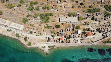 Top-View-Aerial-over-Spinalonga-Fortress-Island-Citadel-Coastline,-Crete,-Greece