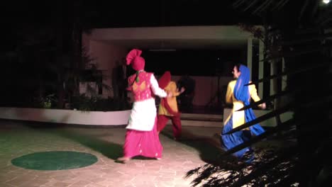 Three-young-dancers-dancing-in-Indian-style