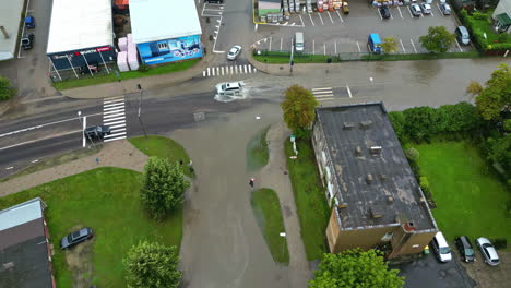 Riga-Latvia-city-infrastructure-flooded-due-to-heavy-rain-powerful-storm,-aerial