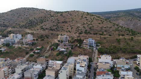 Atenas,-La-Capital-De-Grecia,-Vista-Aérea-Con-Drones-Que-Establecen-Una-Vista-Panorámica-Del-Paisaje-Urbano-Urbano