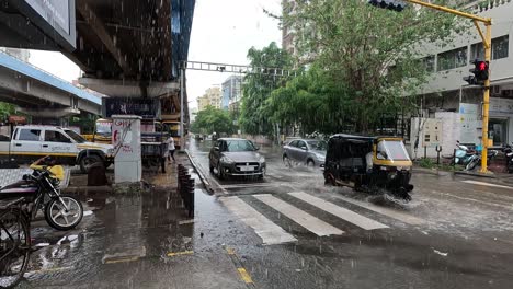 Due-to-extremely-heavy-rains-in-the-city,-water-puddles-are-seen-everywhere-on-the-roads