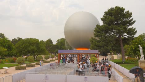 An-innovative-flying-Olympic-flame-in-the-Tuileries-garden-during-the-Olympic-Games