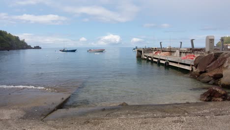 Small-Waves-Splashing-Seaside-Promenade---Wide-Shot