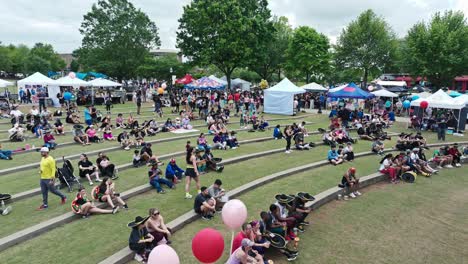 Crowd-Of-People-Visiting-Exhibits-At-Tacos-And-Tequila-5K-Race-In-Suwanee,-Georgia,-USA---Drone-Shot