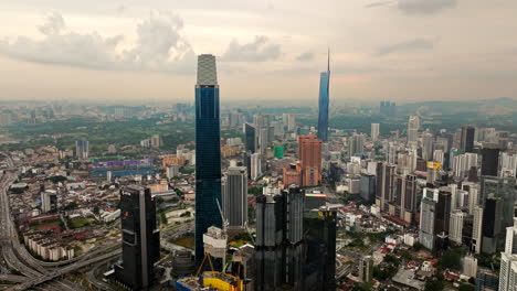 Exchange-106-skyscraper-and-Warisan-Merdeka-Tower,-Kuala-Lumpur,-Malaysia-in-Asia