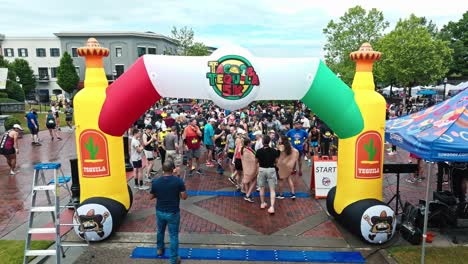 Participants-Joining-The-Tacos-And-Tequila-5K-Race-In-Suwanee,-Georgia,-USA---Drone-Shot