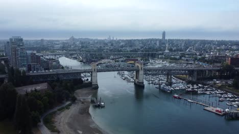 Aerial-view-city-skyline-Burrard-street-bridge-over-false-creek-in-Vancouver