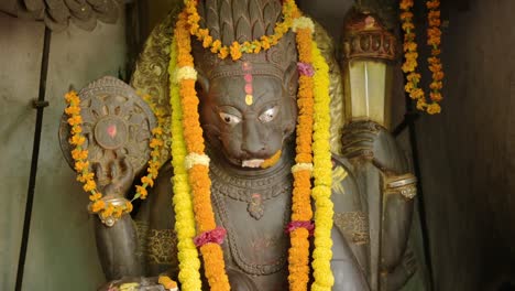 Hindu-Prayer-Offerings-of-Orange-Flowers,-Yellow-Flowers-as-a-Symbol-of-Praying-at-a-Religious-Ceremony-for-Hinduism,-Hindu-Religion-Close-Up-of-a-Religious-Festival-and-Praying-Rituals