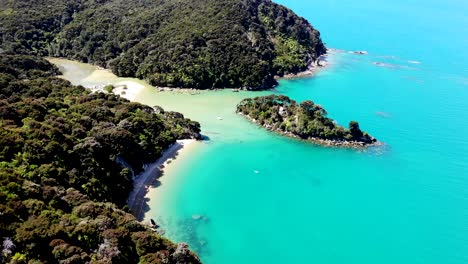 Aerial-view-of-stunning-white-sand-beaches-and-clear-bly