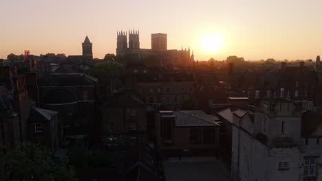 Establishing-Aerial-Drone-Shot-into-the-Sun-over-York-City-and-York-Minster-Cathedral-UK