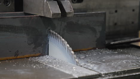 mechanized-saw-cutting-metal-beams-slow-motion