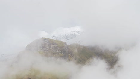 Rugged-Mountains-Scenery-in-Clouds,-Rocky-Himalayas-Mountain-Landscape-Seen-Through-Clouds-Moving-Through-the-Mountains-in-Nepal