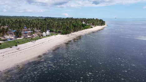 Nay-Palad-Island-Resort-on-Tropical-White-Sand-Beach,-Aerial-Drone-Shot