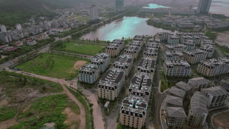 Aerial-view-of-the-sustainable-urban-development-in-Vietnam,-greenery-and-biophilic-design-in-one,-dolly-shot-in-slow-motion