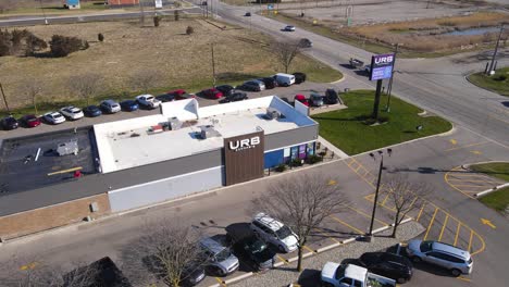 Aerial-establishing-view-of-URB-cannabis-legal-marijuana-store-in-Michigan,-USA