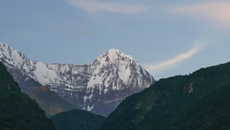 Snowy-Mountain-Time-Lapse-Day-to-Night,-Nepal-Timelapse-in-Himalayas-Mountains-Light-to-Dark-with-Beautiful-Dramatic-Annapurna-Landscape-Scenery,-Background-with-Copy-Space