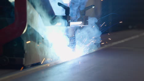 automatic-welding-robot-welding-metal-beam-slow-motion-shot