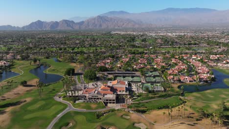 Aerial-pullback-above-multi-sport-complex-by-golf-course-in-Palm-Springs-California-USA