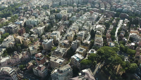 Panoramic-high-angle-overview-of-Trastevere-neighborhood-Rome-Italy-with-cars-driving-along-old-streets