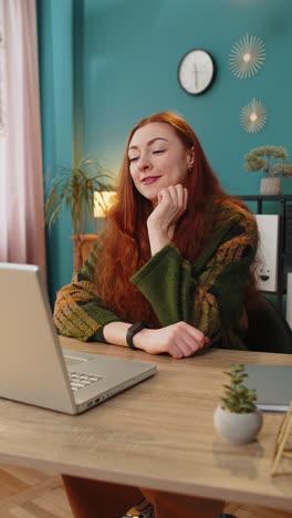 Businesswoman-employee-waves-hand-hi-gesture-greeting-welcomes-someone-at-camera-online-webinar