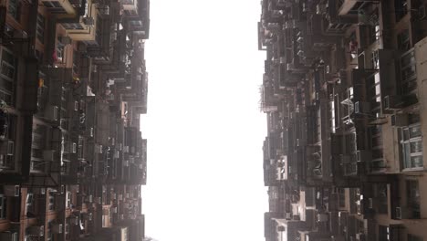 Down-Up-View-Of-Residential-Apartment-Buildings-In-Hong-Kong-City,-Urban-Dwelling