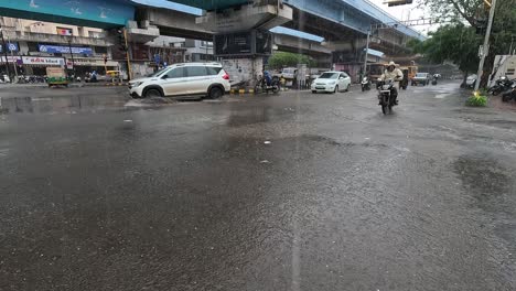 Rain-In-the-rainy-season-people-use-umbrellas-and-raincoats