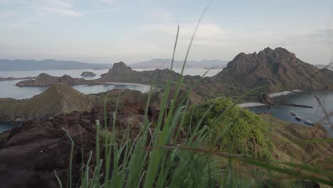 Marvel-at-the-breathtaking-panoramic-view-of-Padar-Island,-Indonesia,-showcasing-its-stunning-landscapes-and-crystal-clear-waters