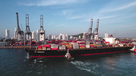 Drone-past-Loading-Docks-and-Cargo-ship_Cartagena-Colombia