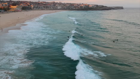 Surfers-and-bodysurfers-from-the-air-Sydney-Bondi-Beach-4k-drone