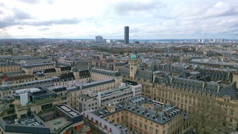 Sorbonne-University-with-Montparnasse-tower-in-background,-Paris-cityscape,-France