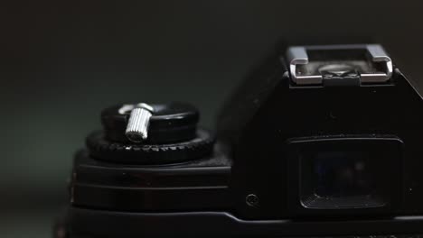 Macro-of-an-old-analog-photo-camera,-shutter-button-and-viewfinder