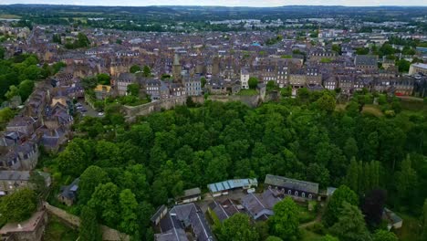 Fougères-city,-Ille-et-Vilaine-in-France.-Aerial-forward