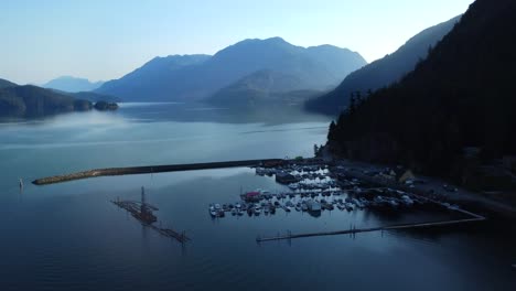 Mountain-valley-and-sailboats-docked-in-marina-at-Harrison-Hot-Springs-Lake