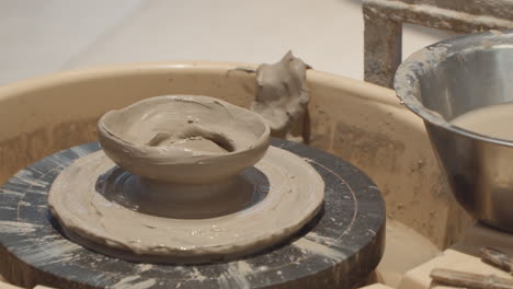 Mud-Clay-Molded-Over-Rotating-Pottery-Wheel